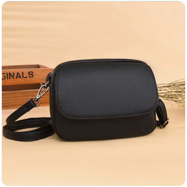 Designer Smooth Finish Mini Crossbody bag.