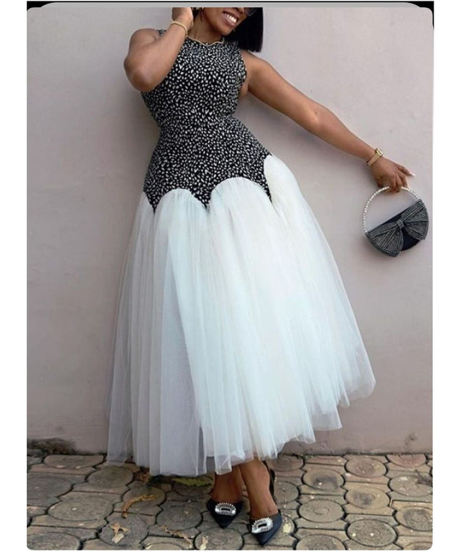 Sleeveless Mermaid Tule Dress.