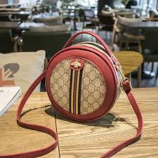 Leather elegant round waterproof ladies sling bag.