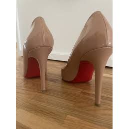 Red bottom stiletto Heel Pumps.